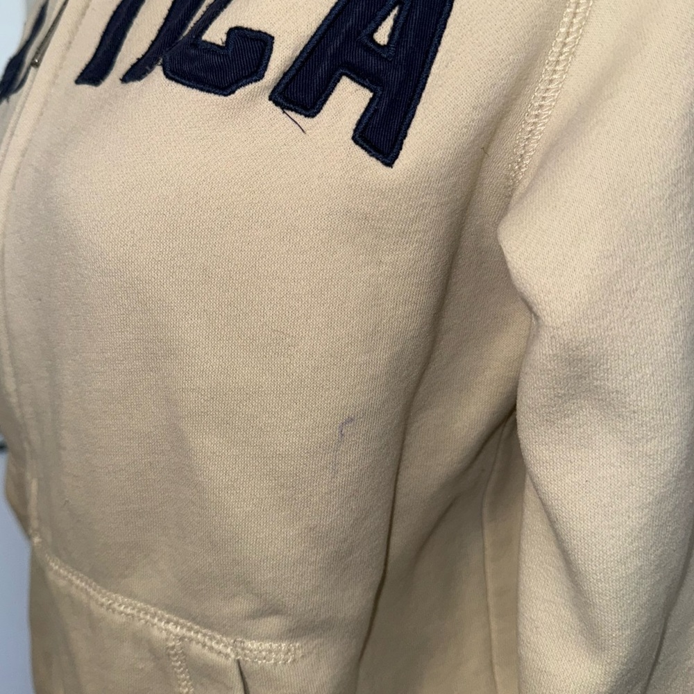 Cream Nautica Hoodie with bold, stitched, navy “NAUTICA” lettering across the ch - Picture 4 of 7